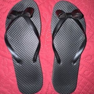Black sandles with bows size small , fits 5 1/2.